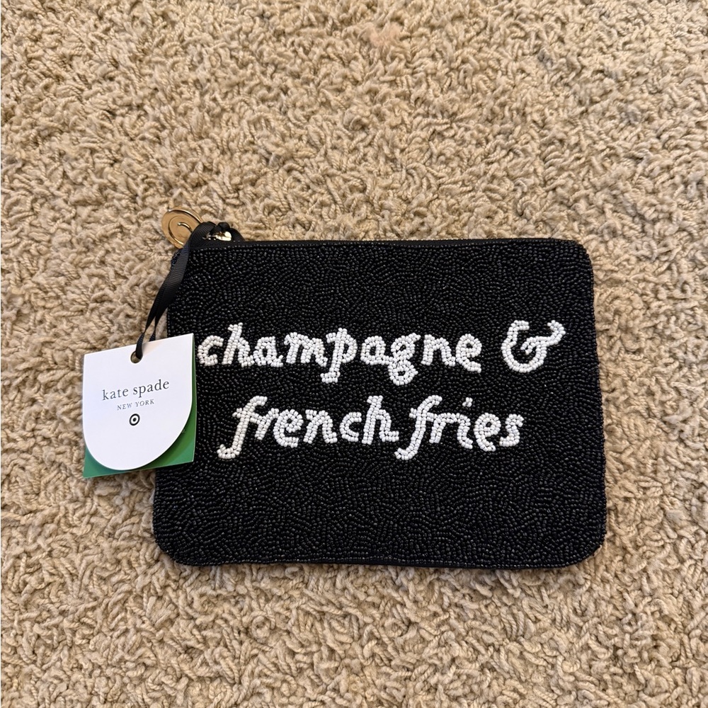 kate spade black beaded wristlet with white script